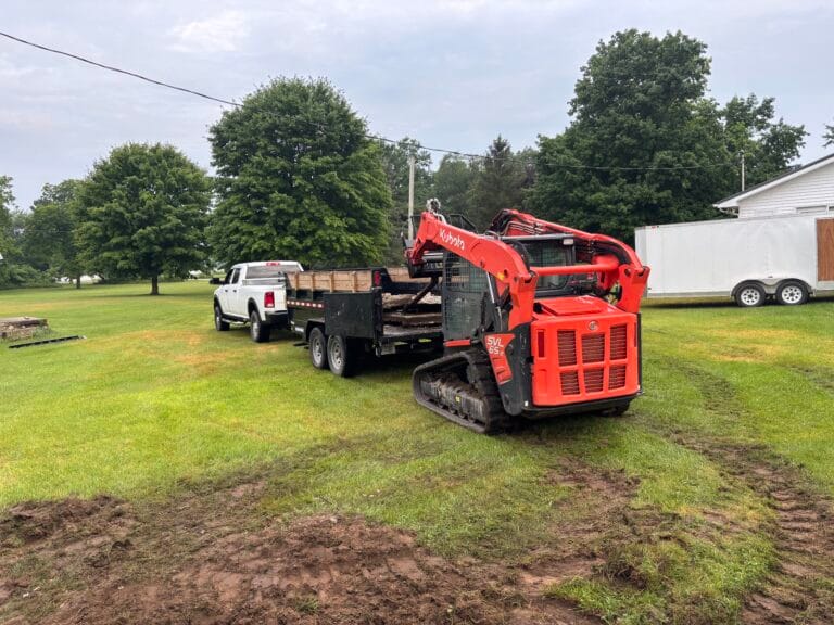 Concrete contractor with skid steer in Jackson, Michigan